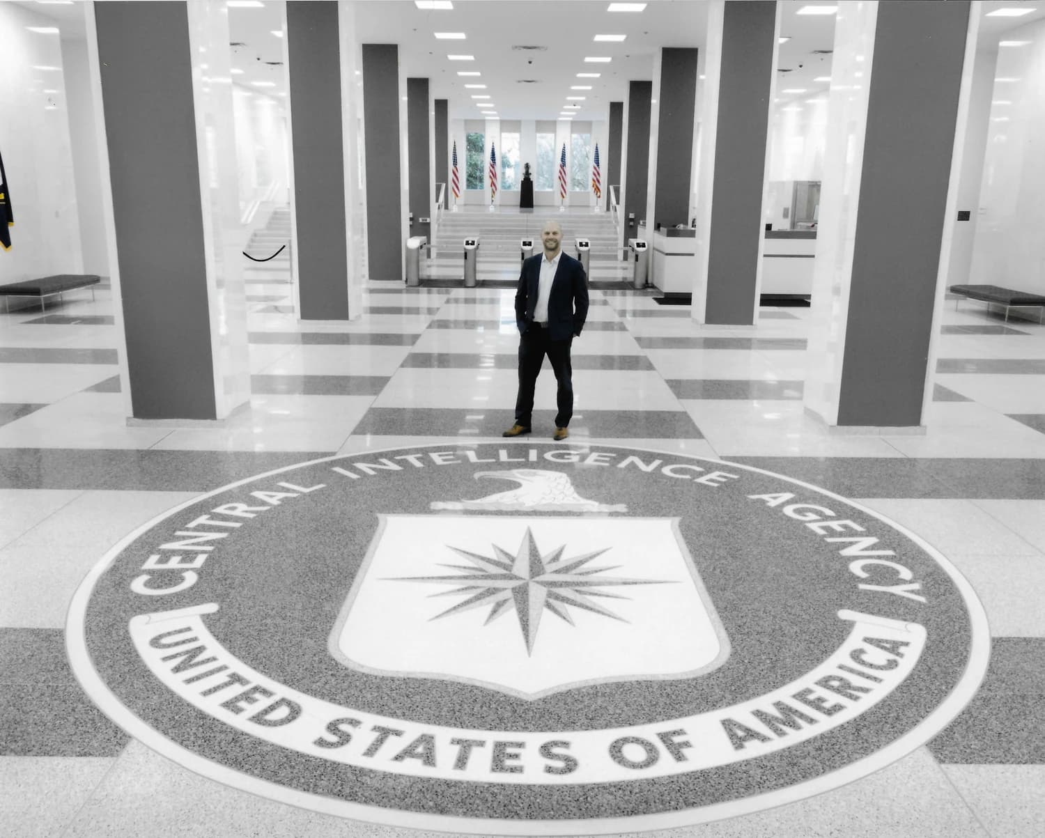 Dug Popovich and family at CIA headquarters on the Central Intelligence Agency seal, 2024 retirement